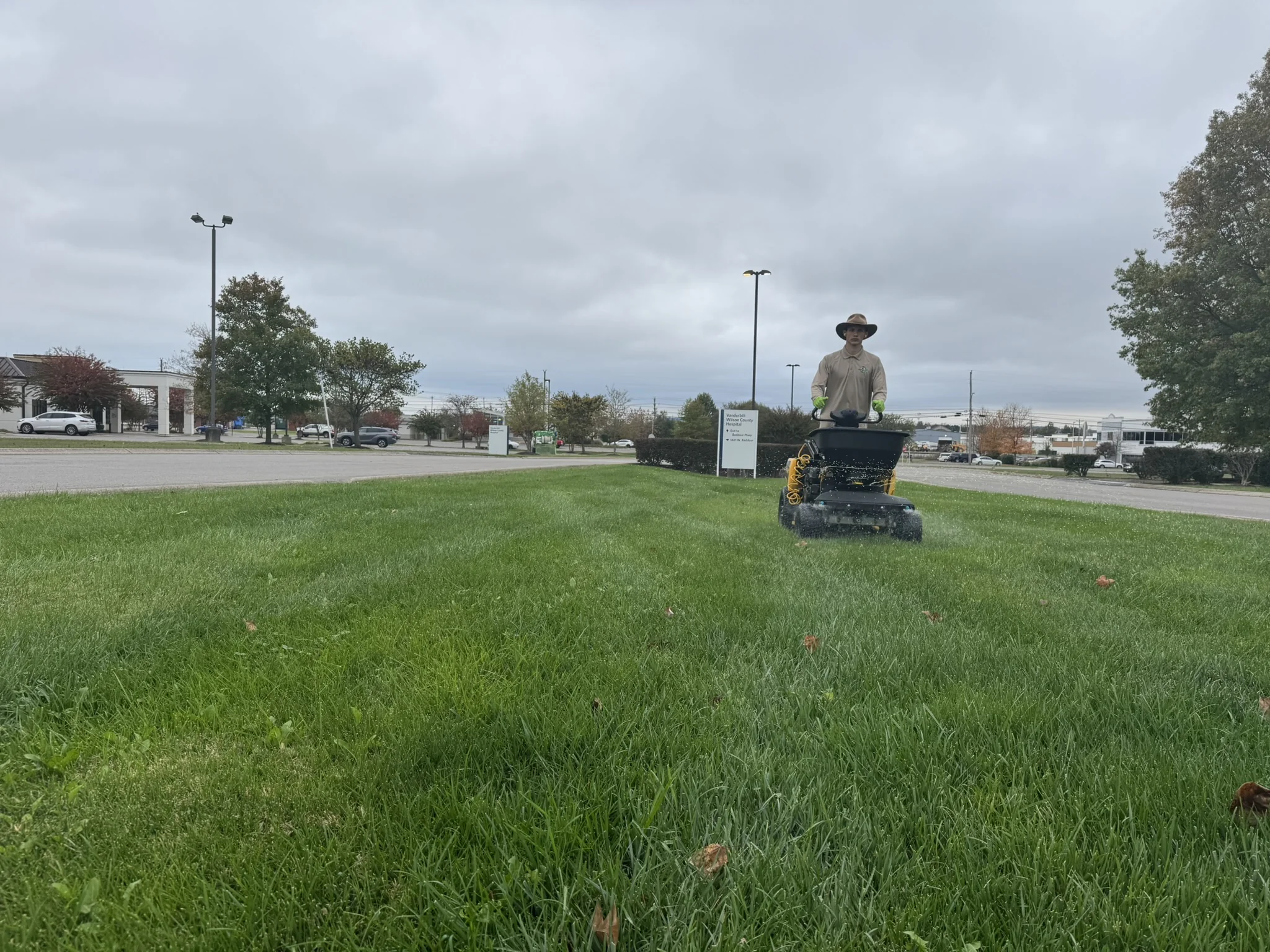 Stinger Gateway Applicator and Our Horticulturist Kirkland Operating It at Vanderbilt Hospital He S Appliying Granular Fertilizer and a Liquid Weed Control Hes Facing Toward Us — Mr. Lawn Care, Middle Tennessee lawn treatment