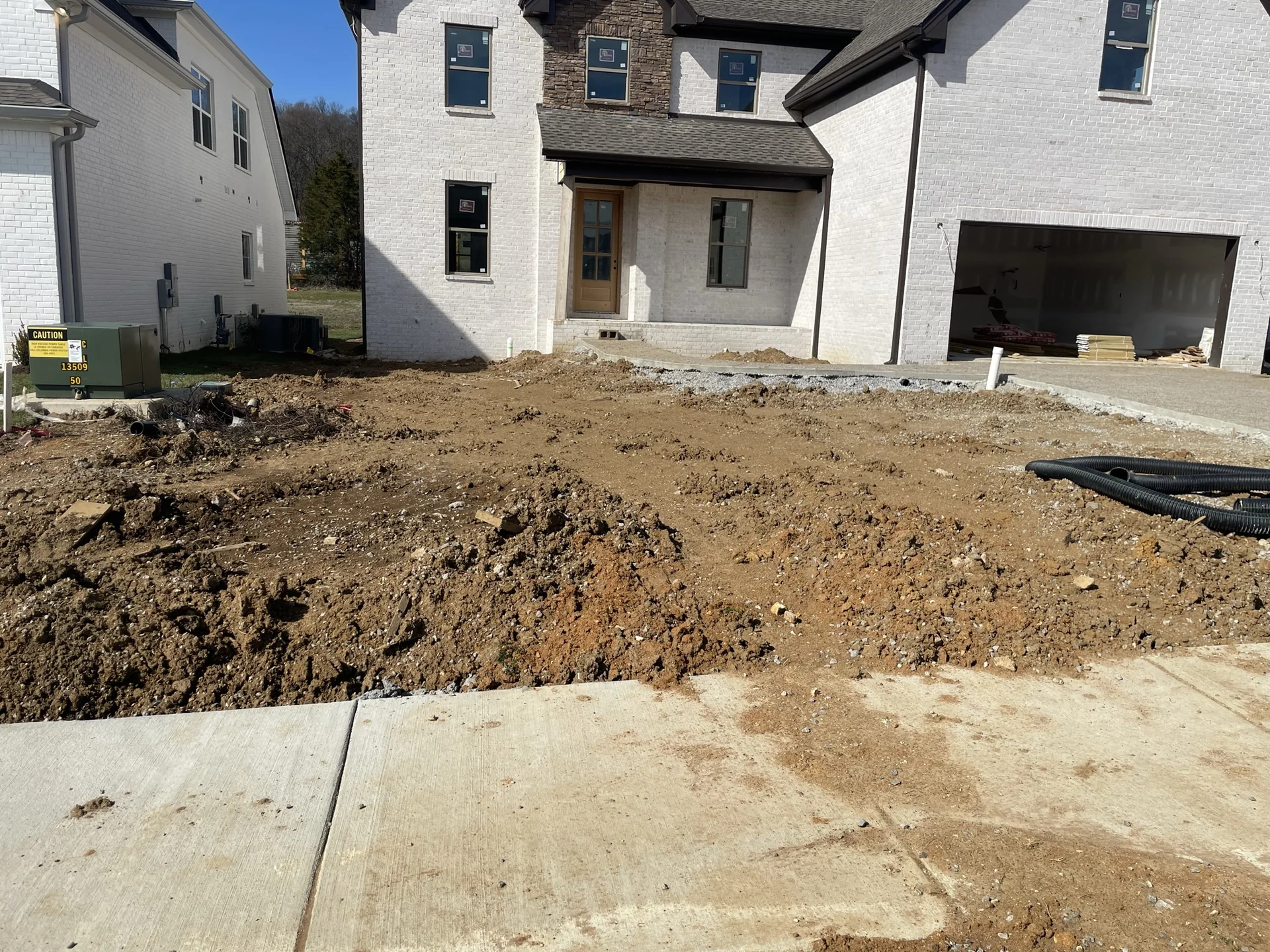 A Nice New Home Being Constructed You Can See How Many Rocks There Are — Mr. Lawn Care, Middle Tennessee lawn treatment